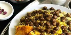 طرز تهیه کلم پلو شیرازی خوشمزه و مجلسی با سبزی خشک
